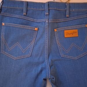 Wrangler Exaggerated Boot Cut In Blue Denim